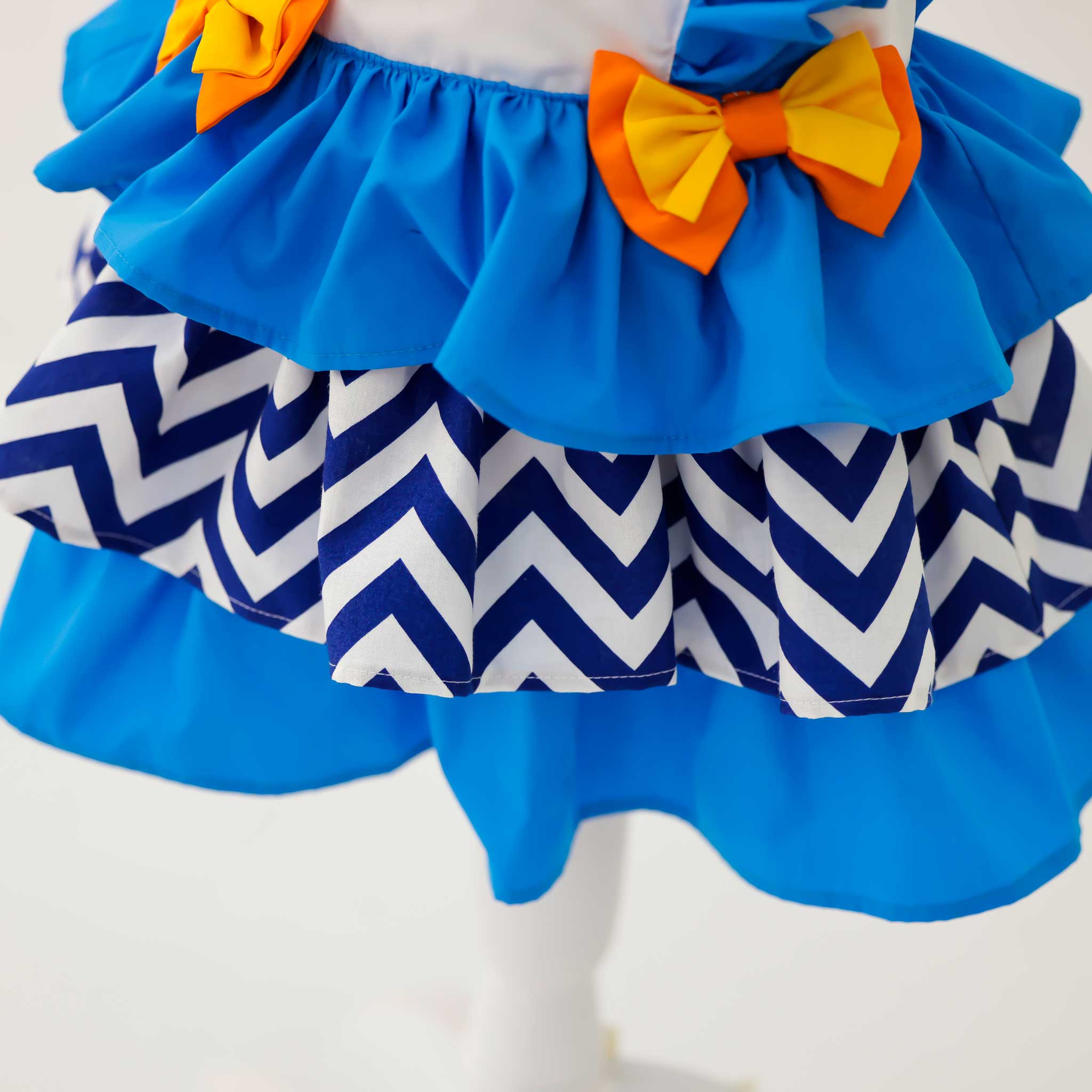 ブルー×オレンジのフリルワンピース - heartmelt こども衣装レンタルこども衣装レンタル